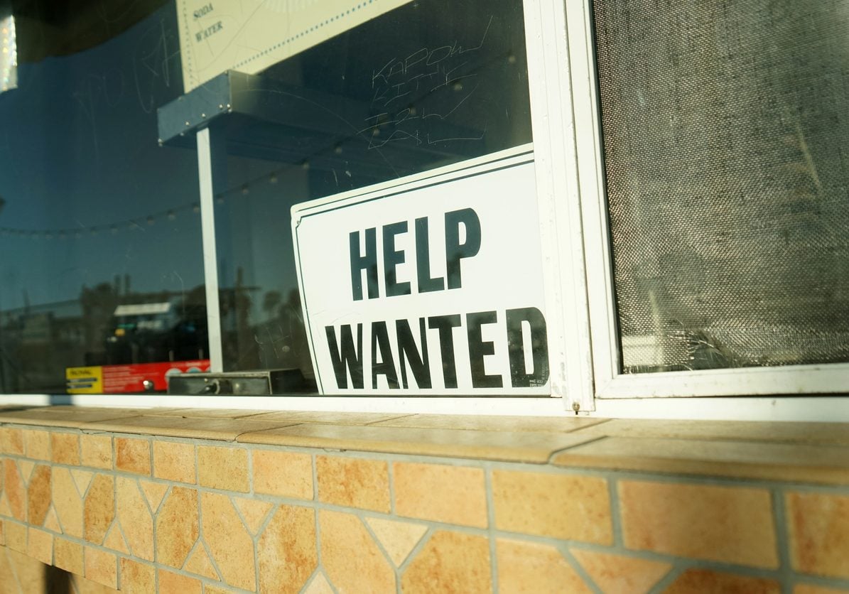 shot of help wanted sign